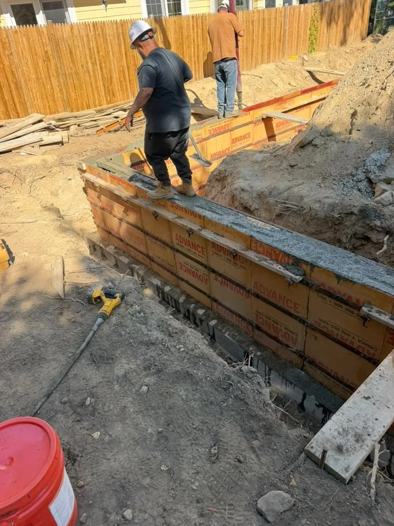 Crew on foundation wall forms