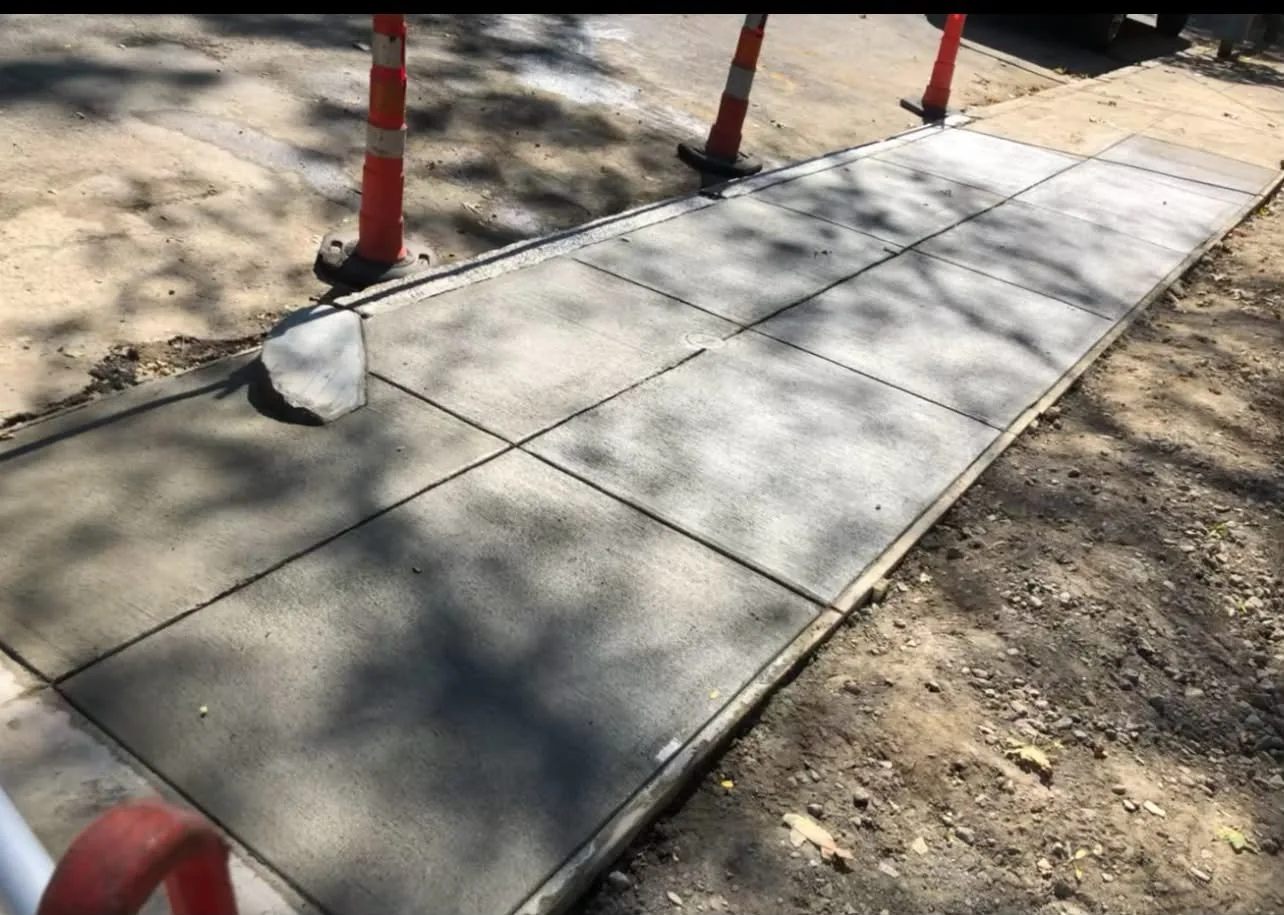New broom-finished sidewalk