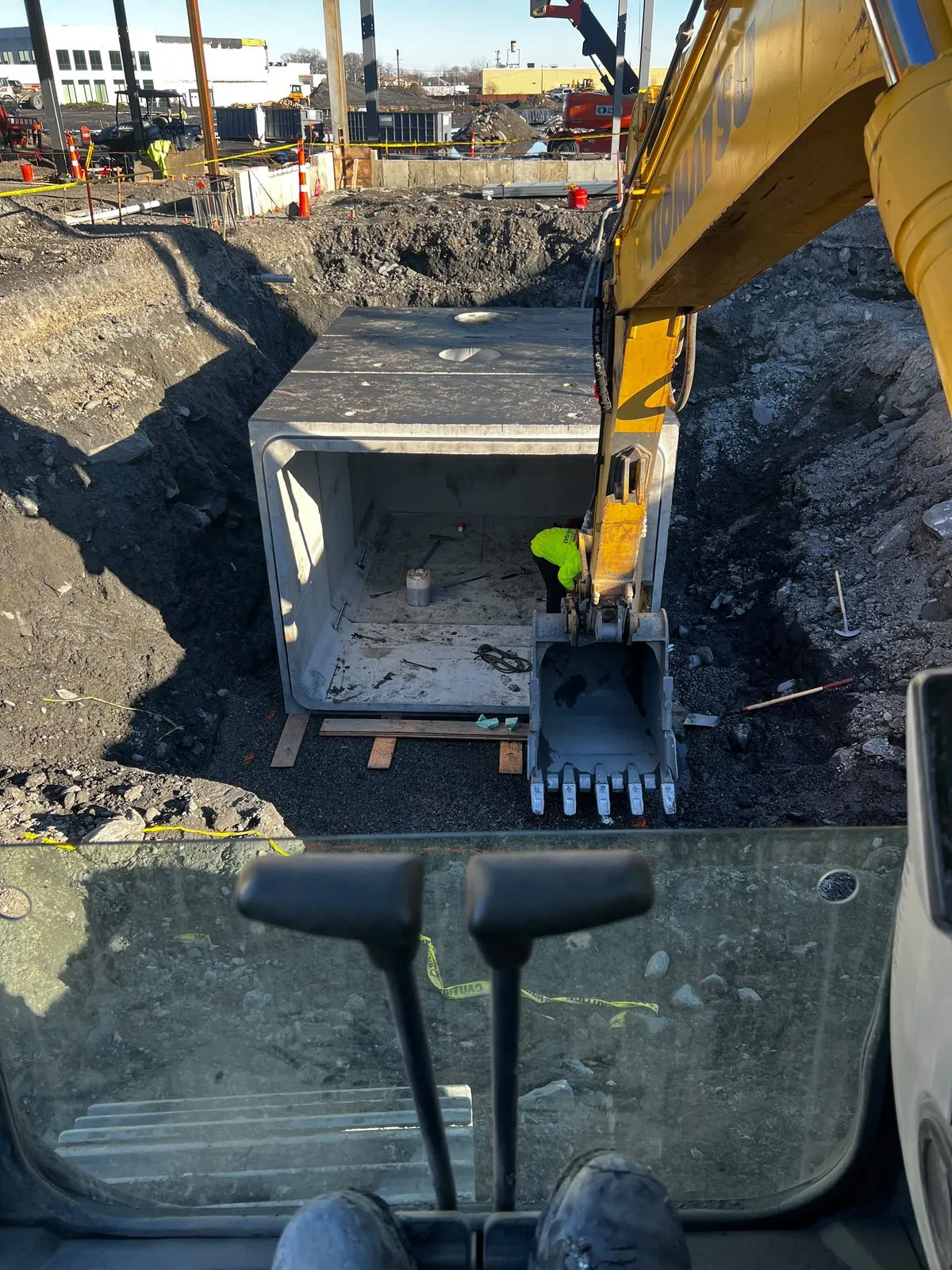 Setting a precast utility structure